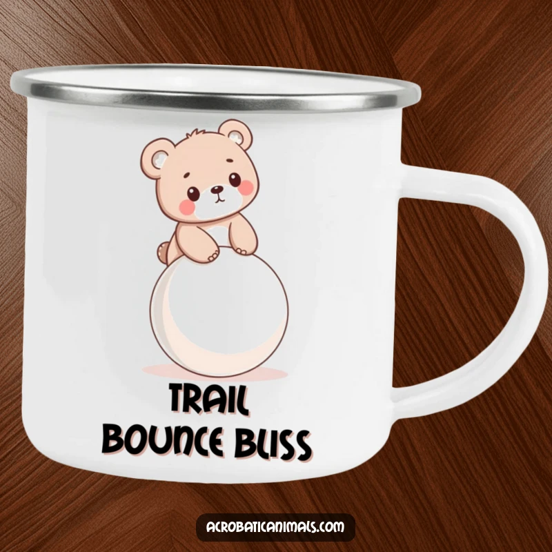 Funny camping mug with a little bear cub balancing on a bouncy ball, perfect for enjoying drinks by the campfire.