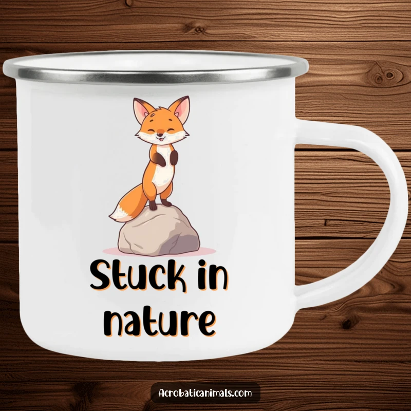 Funny camping mug with a curious fox doing a handstand on a rock, great for enjoying drinks outdoors.