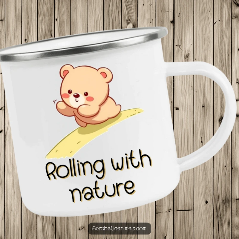 Funny camping mug showing a bear cub rolling down a hill, perfect for enjoying drinks during outdoor escapades.