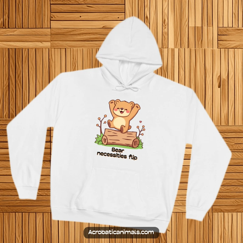 Funny hoodie featuring a joyful bear character mid-cartwheel over a log, combining warmth with energetic fun.