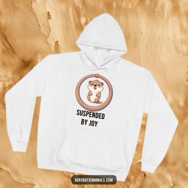 Funny hoodie with a smiling otter gleefully swinging on a ring, exuding playful energy and cozy comfort.