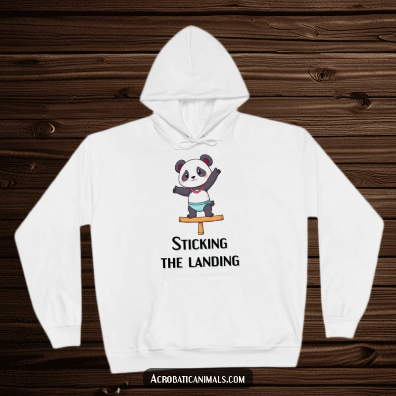 Funny hoodie depicting a confident panda performing a gymnastic pose on a balance beam, offering comfort and style.