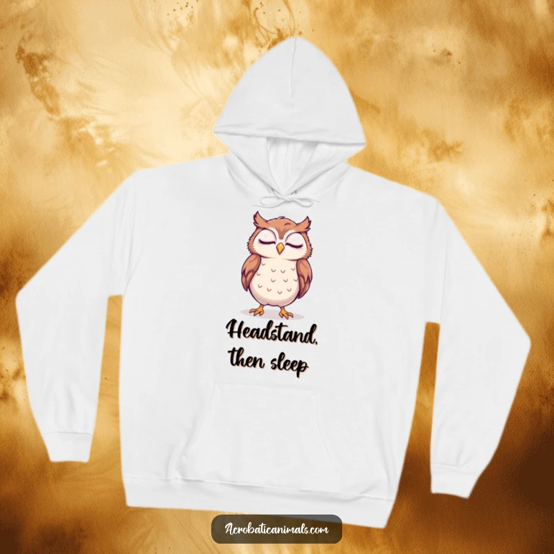 Cozy funny hoodie with a sleepy owl attempting a handstand with a smile, perfect for adding warmth and humorous encouragement.
