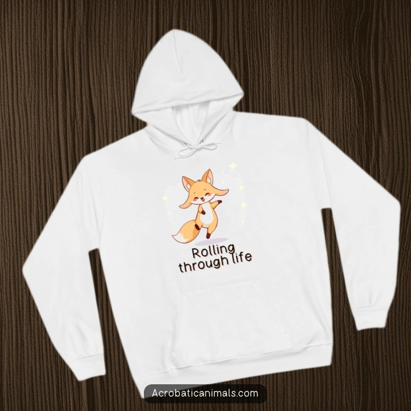 Funny fox hoodie depicting a smiling fox with long ears cartwheeling through a starry night sky, wonderfully amusing.