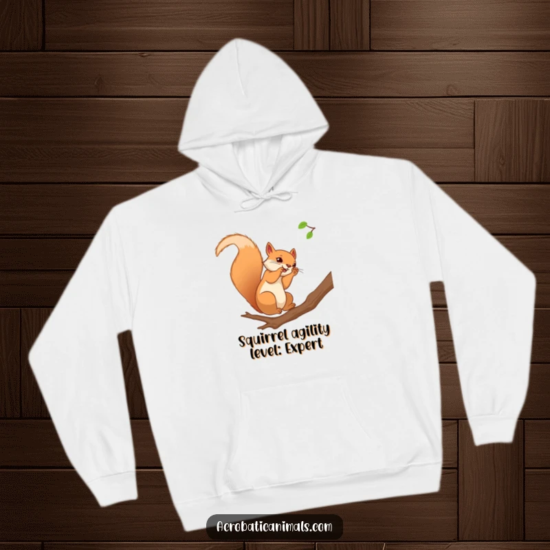 Funny squirrel hoodie featuring a curious squirrel doing a somersault on a branch, blending warmth with playful acrobatics.