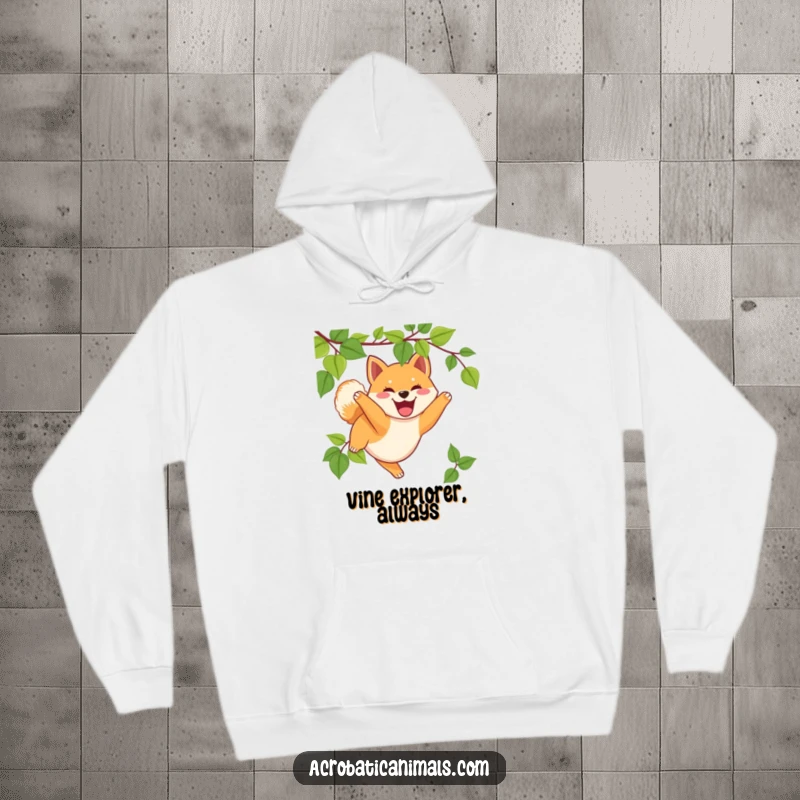 Funny Shiba Inu hoodie featuring a joyful puppy swinging from a vine, designed for warmth and smiles, a great funny gift.