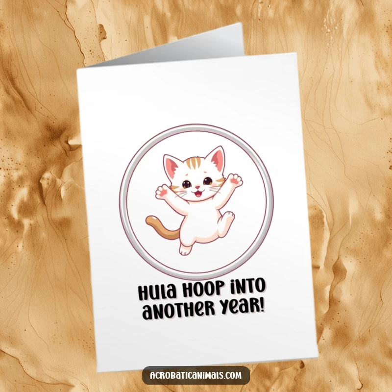 Funny Free Printable Birthday Card featuring a determined kitten hilariously mid-hula hoop leap, full of playful energy.