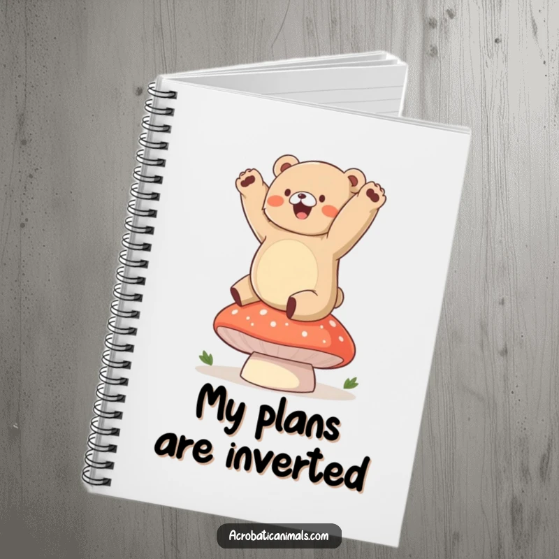 Funny bear notebook featuring a chubby cub gleefully doing a handstand on a mushroom, perfect for jotting down adventures.