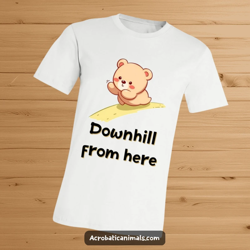 Funny t-shirt featuring a bear cub happily tumbling down a grassy slope, embodying playful outdoor fun.
