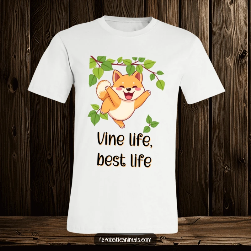 Funny Shiba Inu puppy t-shirt showing the dog swinging happily from a vine, ideal funny gift for energetic dog fans.
