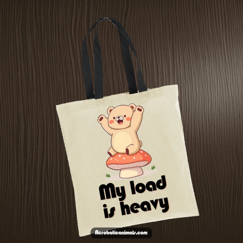 Funny bear tote bag featuring a chubby cub gleefully performing a handstand on a plump mushroom, a humorous accessory.