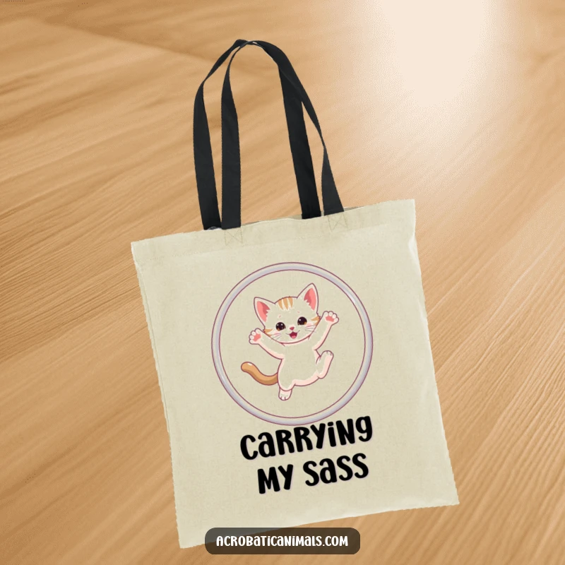 Funny Kitten Hula Hoop Tote Bag designed with a cute kitten mastering the hula hoop, perfect for errands and a touch of humor.